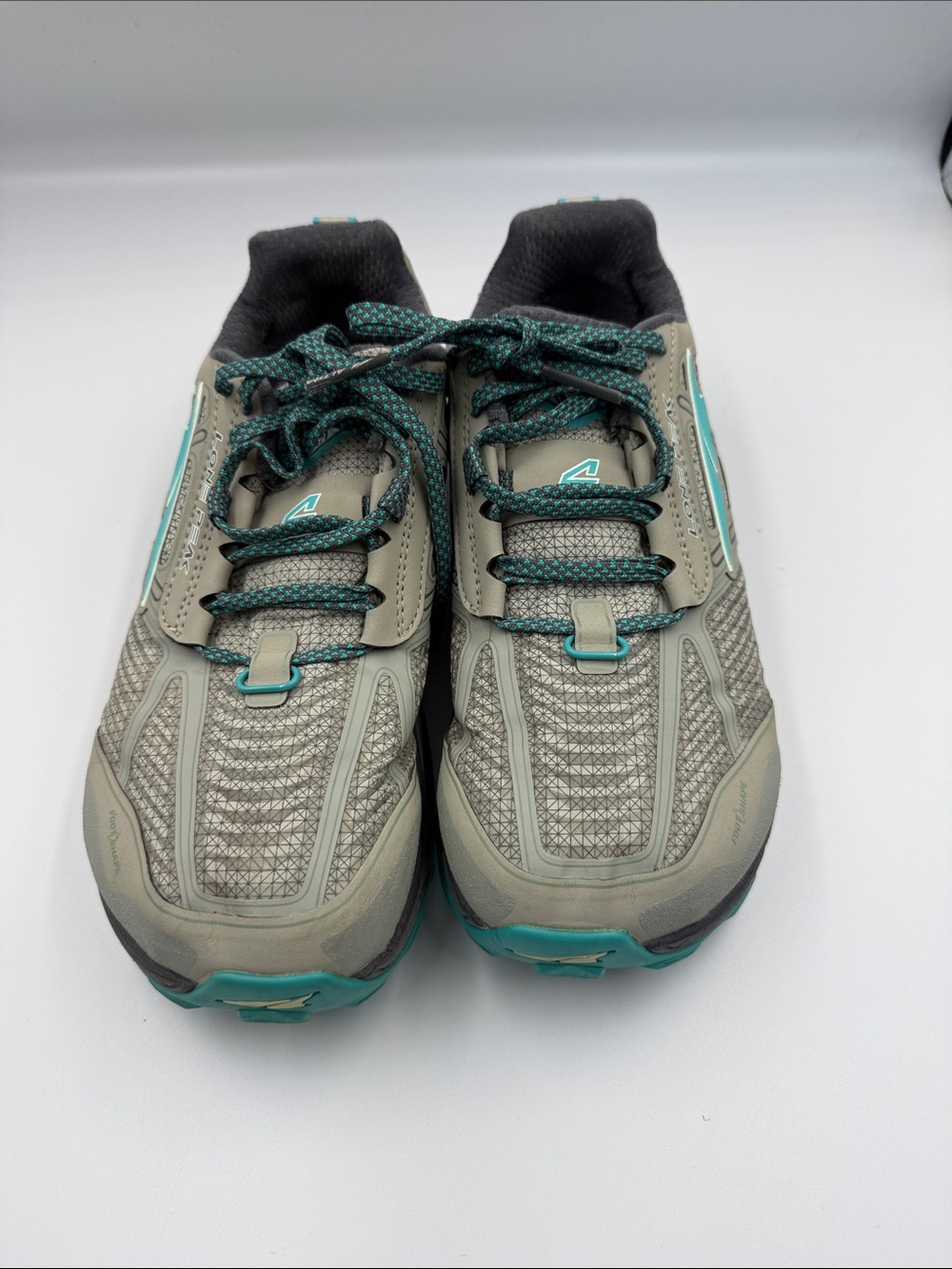 Altra Trail Running Shoes in Light Gray with Teal Accents